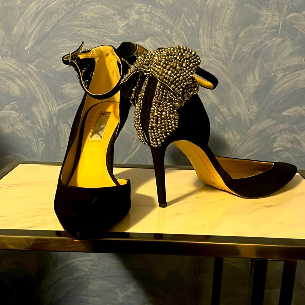 Satin black INC heels with crystal bow in the back. Size 7.5